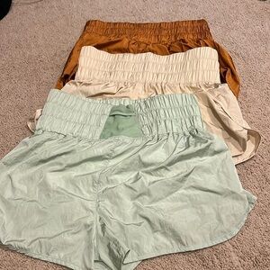 Free people movement running shorts- tan sold! Green and orange left